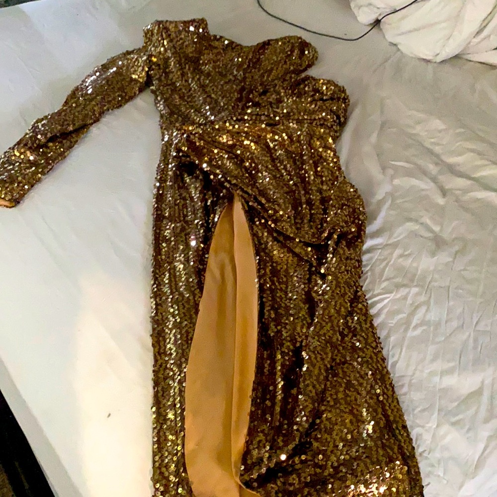 This is a gold sequence Ella Lisque dress